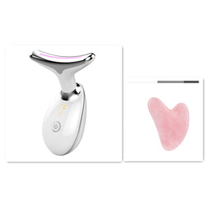 Skincare tool with a pink gua sha tool on a white background