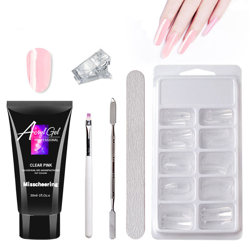 Nail care products including a tube of clear pink acrylic gel, brush, nail file, and nail tips on a white background.