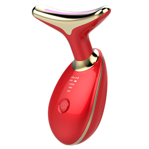 Red and gold electronic device on a white background

