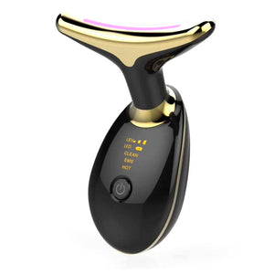 Black and gold electronic device on a white background